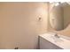 Well-lit half-bath features a modern vanity and sink at 10072 Pelham Park Ave, Las Vegas, NV 89148