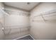 Empty walk-in closet features wire shelving for ample storage at 10072 Pelham Park Ave, Las Vegas, NV 89148