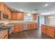 Beautiful kitchen with stainless steel appliances, gas range, and granite countertops with a view to the backyard at 10072 Pelham Park Ave, Las Vegas, NV 89148