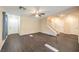 Spacious living area with hardwood floors, a staircase, and natural light at 10072 Pelham Park Ave, Las Vegas, NV 89148