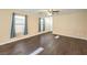 Bright living room featuring hardwood floors, neutral paint, and window at 10072 Pelham Park Ave, Las Vegas, NV 89148