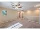 Spacious loft with ceiling fan and natural light, perfect for a playroom or home office at 10072 Pelham Park Ave, Las Vegas, NV 89148