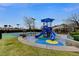 A recreational area featuring a colorful playground and sports courts at 10671 Capesthorne Way, Las Vegas, NV 89135