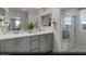 Clean bathroom offers dual sinks, modern fixtures, and a glass-enclosed shower for a spa-like experience at 1168 Heliodor Ave # Lot 152, Henderson, NV 89011