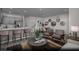 Inviting living space shows modern decor, a dining area, and an open kitchen, ideal for entertaining at 1168 Heliodor Ave # Lot 152, Henderson, NV 89011