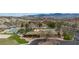 Aerial view of community clubhouse and pool area with mountain views in the background offering a tranquil and desirable setting at 1187 Mohave Dr, Mesquite, NV 89027