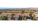 Stunning aerial view of desert community showcasing beautiful homes, desert landscaping and mountain views at 1187 Mohave Dr, Mesquite, NV 89027