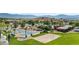 Community pool, tennis, basketball, and volleyball courts surrounded by desert landscaping and houses at 1187 Mohave Dr, Mesquite, NV 89027