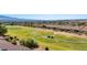 Scenic backyard view overlooking the lush green golf course, creating a serene and picturesque setting at 1187 Mohave Dr, Mesquite, NV 89027
