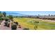 Scenic backyard view overlooking the lush green golf course and desert landscaping, perfect for outdoor activities at 1187 Mohave Dr, Mesquite, NV 89027