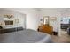Comfortable bedroom with carpet flooring, mirrored closet and dresser at 1187 Mohave Dr, Mesquite, NV 89027