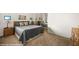Comfortable bedroom with carpet flooring, mirrored closet and neutral decor at 1187 Mohave Dr, Mesquite, NV 89027