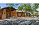 Exterior view of community clubhouse with desert landscaping and shade structure at 1187 Mohave Dr, Mesquite, NV 89027