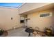 Inviting courtyard with table and chairs, attractive plants, and a welcoming entry area at 1187 Mohave Dr, Mesquite, NV 89027