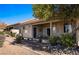 Exterior showcasing a charming patio and landscaped yard at 1187 Mohave Dr, Mesquite, NV 89027