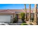Charming single-story home with a well-manicured lawn and desert landscaping at 1187 Mohave Dr, Mesquite, NV 89027
