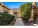Welcoming front entrance with desert landscaping and a charming courtyard visible from the walkway at 1187 Mohave Dr, Mesquite, NV 89027