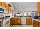 Modern kitchen featuring updated appliances and ample counter space, enhancing the cooking experience and offering room to dine at 1187 Mohave Dr, Mesquite, NV 89027