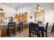 Bright kitchen with ample cabinet space and a breakfast bar for casual dining, blending style and functionality at 1187 Mohave Dr, Mesquite, NV 89027