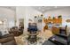 Open living room with a view to the kitchen and guest bedroom at 1187 Mohave Dr, Mesquite, NV 89027