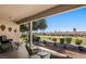 Inviting covered patio with views of the golf course and desert landscaping at 1187 Mohave Dr, Mesquite, NV 89027
