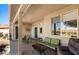 Charming covered patio with ample seating, ideal for enjoying the outdoors at 1187 Mohave Dr, Mesquite, NV 89027