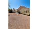 Backyard featuring a gravel ground cover and a desert landscape at 1318 Pine Terrace Ct, North Las Vegas, NV 89031