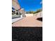 Backyard featuring a gravel ground cover, a block wall, and a desert landscape at 1318 Pine Terrace Ct, North Las Vegas, NV 89031