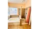 Bathroom featuring a tub and shower combination with a curtain at 1318 Pine Terrace Ct, North Las Vegas, NV 89031
