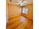 Bedroom with hardwood floors, neutral wall color, and a window allowing natural light at 1318 Pine Terrace Ct, North Las Vegas, NV 89031