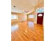 Bright living room with high ceilings, lots of natural light, and beautiful hardwood floors at 1318 Pine Terrace Ct, North Las Vegas, NV 89031