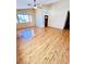 Bright living room with high ceilings, lots of natural light, and beautiful hardwood floors at 1318 Pine Terrace Ct, North Las Vegas, NV 89031