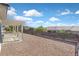 Backyard with stone ground and covered patio at 1735 Black Fox Canyon Rd, Henderson, NV 89052