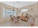 Charming dining area with natural light, tile floors and neutral color palette at 1735 Black Fox Canyon Rd, Henderson, NV 89052