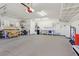 Spacious two car garage with extra storage and workbench at 1735 Black Fox Canyon Rd, Henderson, NV 89052