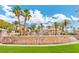 Beautiful resort-style villas with mature palm trees and a stunning tiered water feature at 2050 W Warm Springs Rd # 312, Henderson, NV 89014