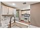 Bright kitchen with modern countertops, stainless steel appliances, and white cabinetry at 2050 W Warm Springs Rd # 312, Henderson, NV 89014
