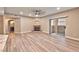 Living room with a fireplace, sliding glass door, and sleek flooring at 2050 W Warm Springs Rd # 312, Henderson, NV 89014