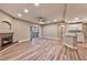 Spacious living room featuring a fireplace, patio access, and modern flooring at 2050 W Warm Springs Rd # 312, Henderson, NV 89014