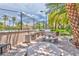 A built-in outdoor grill area, perfect for gatherings, with seating and beautiful desert landscaping at 2050 W Warm Springs Rd # 312, Henderson, NV 89014
