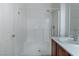 Modern bathroom featuring a tiled shower, neutral walls, and a contemporary vanity at 2056 Bay Thrush Way, North Las Vegas, NV 89084
