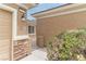 Close-up of the front entrance showcasing stone accents and desert landscaping at 2056 Bay Thrush Way, North Las Vegas, NV 89084
