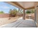 Covered patio offering a BBQ area, views of desert plants, and serene outdoor living at 2056 Bay Thrush Way, North Las Vegas, NV 89084