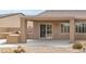 Covered patio featuring a built-in BBQ area, offering the perfect space for outdoor entertaining at 2056 Bay Thrush Way, North Las Vegas, NV 89084