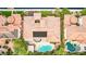 Aerial view of a terracotta-roofed home featuring a backyard pool and landscaped surroundings at 213 Villa Borghese St, Las Vegas, NV 89138