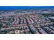 Wide aerial shot of a residential area, showcasing diverse housing with desert landscaping at 213 Villa Borghese St, Las Vegas, NV 89138
