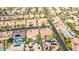 Aerial view of an upscale community featuring luxurious homes, private pools, and mature landscaping at 213 Villa Borghese St, Las Vegas, NV 89138