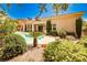 A well-maintained backyard showcasing the pool, spa, and mature landscaping at 213 Villa Borghese St, Las Vegas, NV 89138