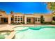 The backyard boasts a pool, jacuzzi, and mature landscaping, creating a private oasis at 213 Villa Borghese St, Las Vegas, NV 89138