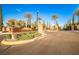 Barrington community entrance sign surrounded by lush landscaping and palm trees under a clear blue sky at 213 Villa Borghese St, Las Vegas, NV 89138